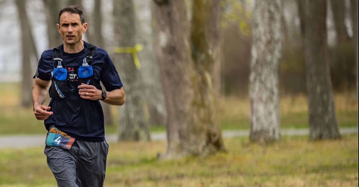 Long-distance runner completing an ultramarathon injury-free